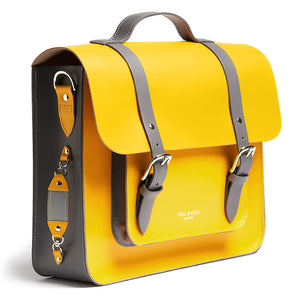Bright yellow leather satchel cycle bag with reflective detailing