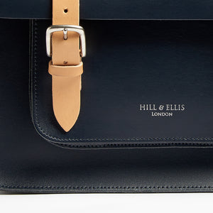 Navy and Tan leather satchel cycle bag detail of Hill & Ellis embossing