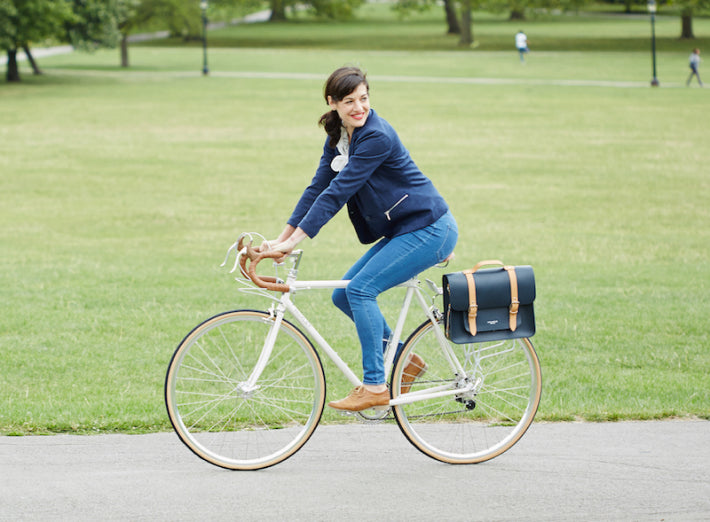 Leather pannier bag navy on bicycle