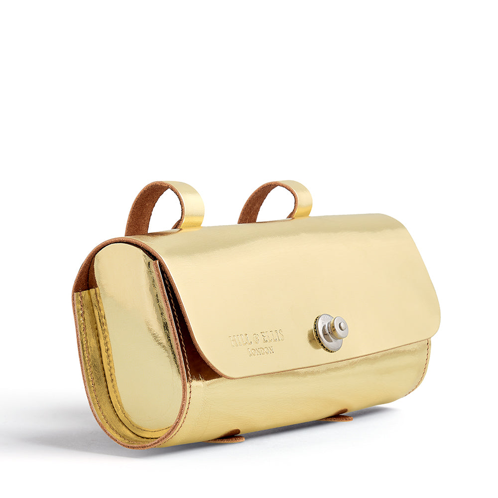 Gold leather saddle bag on side