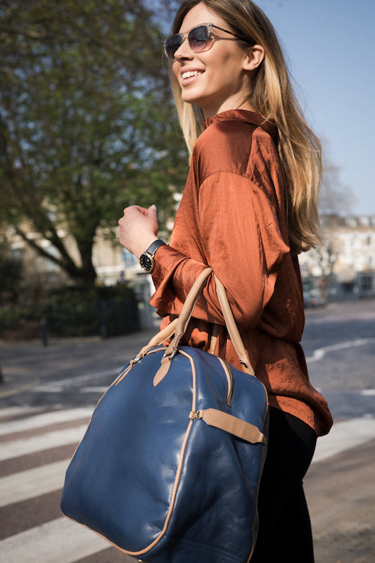 Blue and tan leather cycling bag