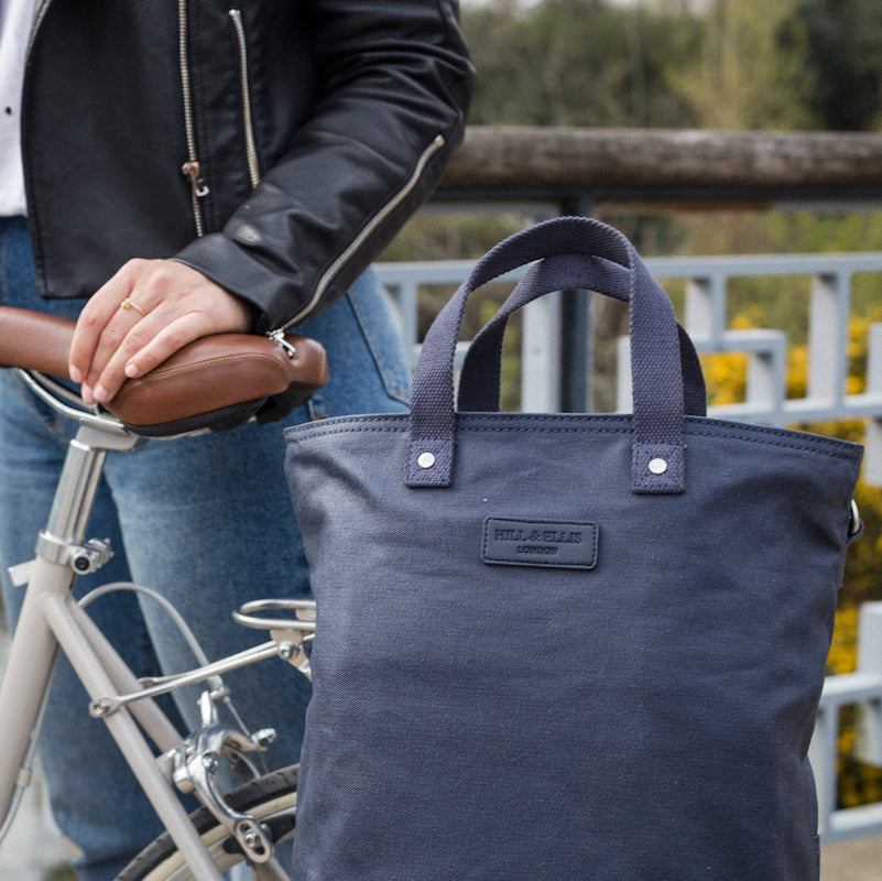 Navy canvas cycling bag on bicycle