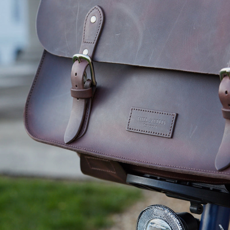 
            
                Load image into Gallery viewer, Brown leather brompton compatible cycle bag on bicycle
            
        